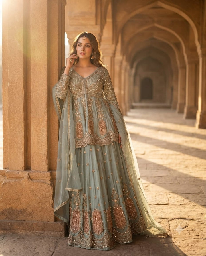 Royal Sky Blue Tissue Silk Sharara Set adorned with sequins, pearl & cutdana embroidery.