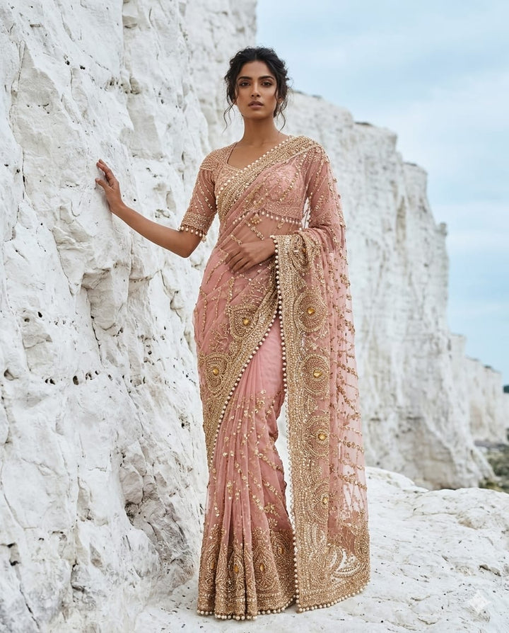 Drop 41-Pink net saree with elegant bead and sequin work, paired with an unstitched blouse
