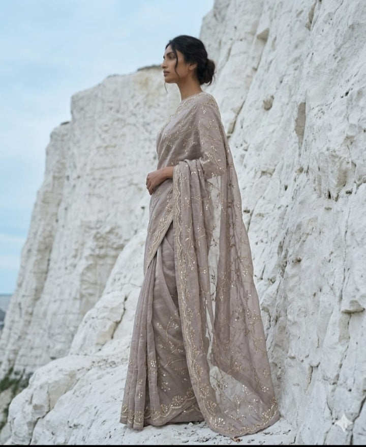 Drop 45 - Elegant grey tissue saree adorned with delicate beadwork.