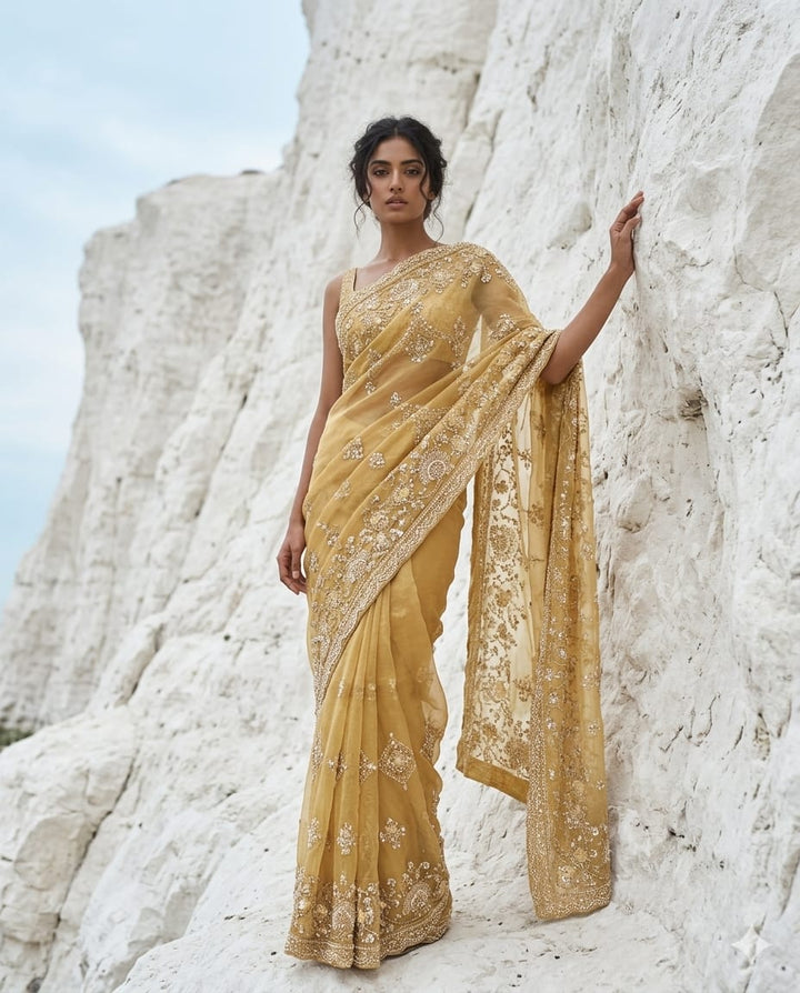 Drop 49 - Golden Organza Saree with bead & sequin embroidery and unstitched blouse.