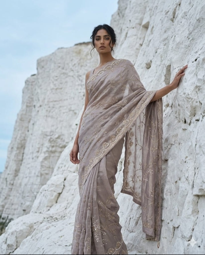 Drop 45 - Elegant grey tissue saree adorned with delicate beadwork.