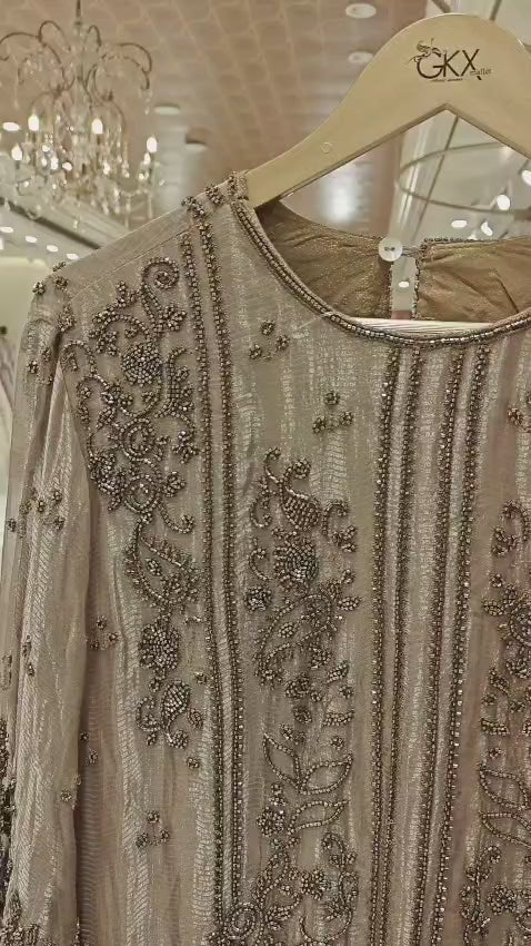 Premium Silver Pakistani Suit Designed For A Royal Festive Look.