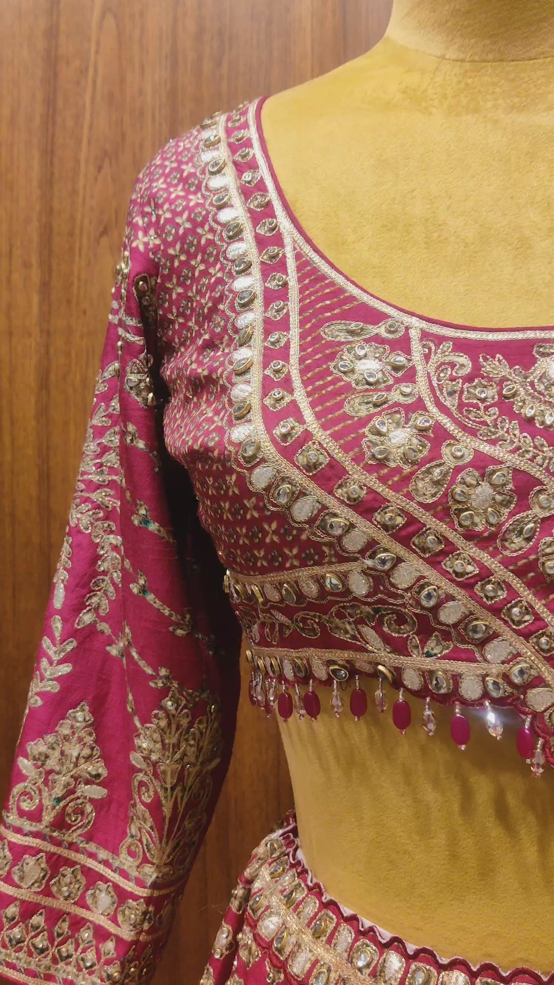 Elegant pink crepe lehenga with heavy embroidery for a royal festive look.